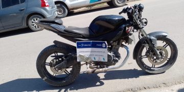 IBA EN UNA MOTO ROBADA